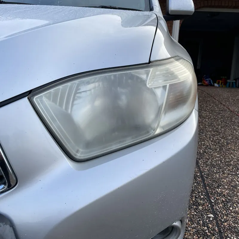 Headlight before detailing